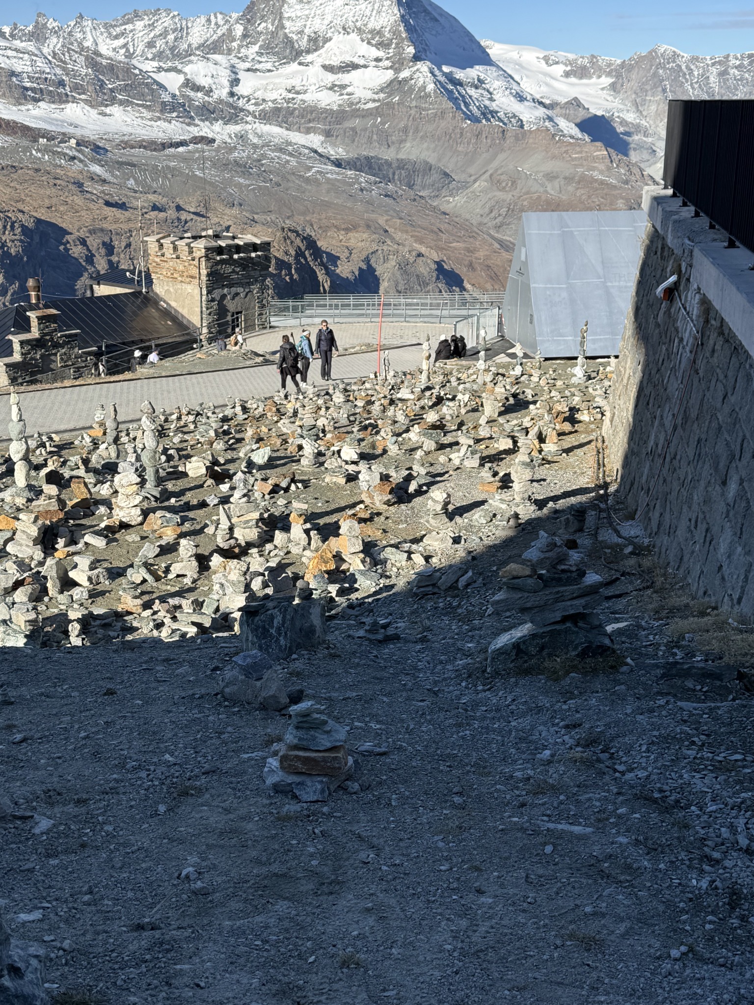 Stacked stones at the Gornergrat memorial to climbers